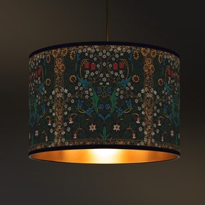 Lampshade Artisanal Style, Medieval Floral Pattern, Lampshade fabric and golden interior for warm lighting against a dark green background