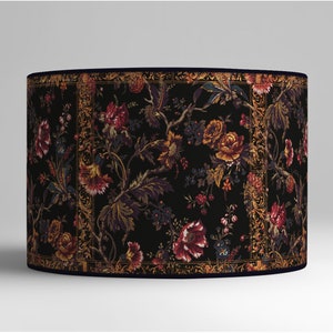 Decorative lampshade with intricate floral design and ornate borders