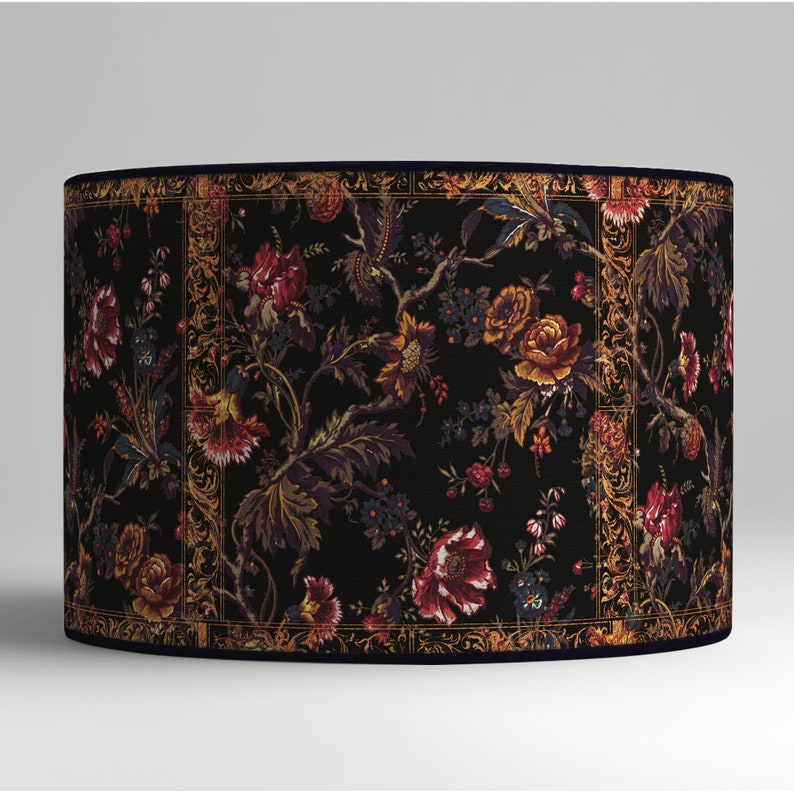 Decorative lampshade with intricate floral design and ornate borders