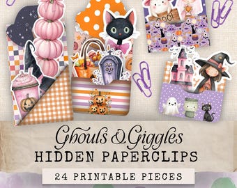 May include: A collection of Halloween-themed paperclips with various designs, including pumpkins, a black cat, ghosts, and a witch. The text "Ghouls & Giggles HIDDEN PAPERCLIPS" and "24 PRINTABLE PIECES" are also visible.