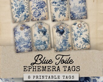May include: Eight printable blue and white toile patterned gift tags. The tags feature a variety of designs including floral patterns, a bird on a branch, and a woman in a blue dress. The text "Blue Toile Ephemera Tags" and "8 Printable Tags" is printed on the image.