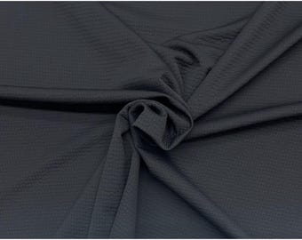 Chaqueta Polartec Power Air negra elástica. Tejido cortado a la medida 67 W.