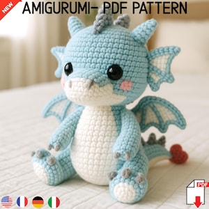 Peut inclure: Amigurumi de dragon bleu crocheté avec ventre et accents blancs. Le dragon a de grands yeux noirs, de petites ailes et une queue en forme de cœur rouge. Le texte "AMIGURUMI - PDF PATTERN" est en haut.