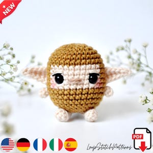 May include: A white ceramic mug with a black handle and the text "But First, Coffee" in a black, bold font. The mug is on a white surface.