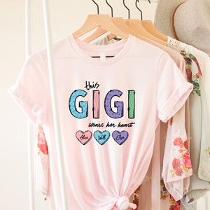 This Gigi Wears Her Heart Shirt, Gigi Shirt, Grandkids Name Shirt, Mothers Day Gift Shirt, Gift For Grandma, Personalized Gigi T-Shirt