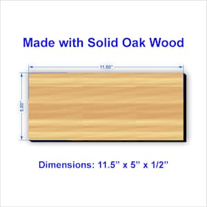 Op de afbeelding: Een rechthoekig stuk massief eikenhout met een lichtbruine houtnerf. De tekst luidt Made with Solid Oak Wood en Dimensions: 29,21 cm x 12,7 cm x 1,27 cm. Blauwe maatlijnen geven een lengte van 29,21 cm en een breedte van 12,7 cm aan.