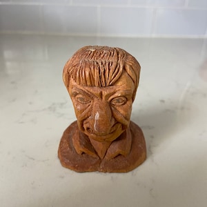 Vintage Hand Carved Wood Male Bust 3&quot; his face has an interesting grimace and he is wearing a hat-great collectible or decor item