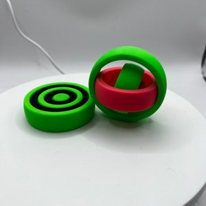 Cosmic orbiting fidget toys (x2)