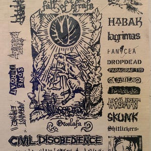 May include: A cream-colored poster with dark blue ink illustrations and text. The central image features a rabbit illuminated by a sunburst, with the words "fall of frafa" above. Various band names and phrases, including "Civil Disobedience" and "Appalachian Terror Linet," are also printed.