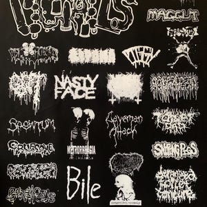 May include: Black fabric with multiple white graphic designs, including the word "GIRLS" in a stylized font, and other band logos. The designs are in a variety of fonts and styles, creating a collage effect.