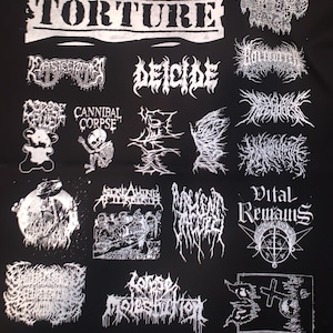 May include: Black fabric featuring multiple white logos of heavy metal bands, including "TORTURE," "DEICIDE," and "CANNIBAL CORPSE." The logos are in a gothic, stylized font.