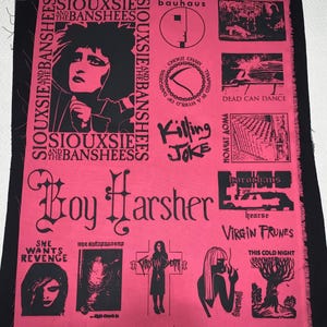 May include: A pink fabric panel featuring black graphic designs and text. The panel includes band names like Siouxsie and the Banshees, Bauhaus, and Boy Harsher. Other graphics include illustrations and text such as "Dead Can Dance."