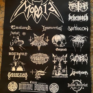 May include: Black fabric patch featuring white logos of various heavy metal bands, including Morbid, Behemoth, and Dimmu Borgir. The patch has a stitched edge and a variety of band logos in a gothic font.
