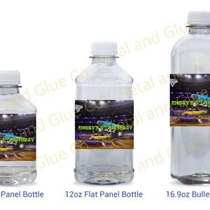 May include: Three clear plastic water bottles of varying sizes, each with a label featuring a monster truck design and the text "Emory's Birthday." The bottles are labeled as 8oz, 12oz, and 16.9oz.