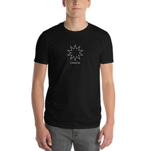 Peut inclure: Un t-shirt noir avec un motif d'étoile éclatante blanche et le mot "Celestial" imprimé en dessous.