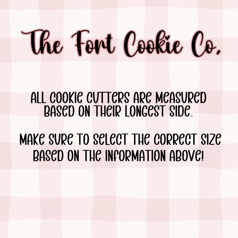 May include: A pink and white checkered background with the text "The Fort Cookie Co." in a cursive font. The text below states that cookie cutters are measured by their longest side and to select the correct size.
