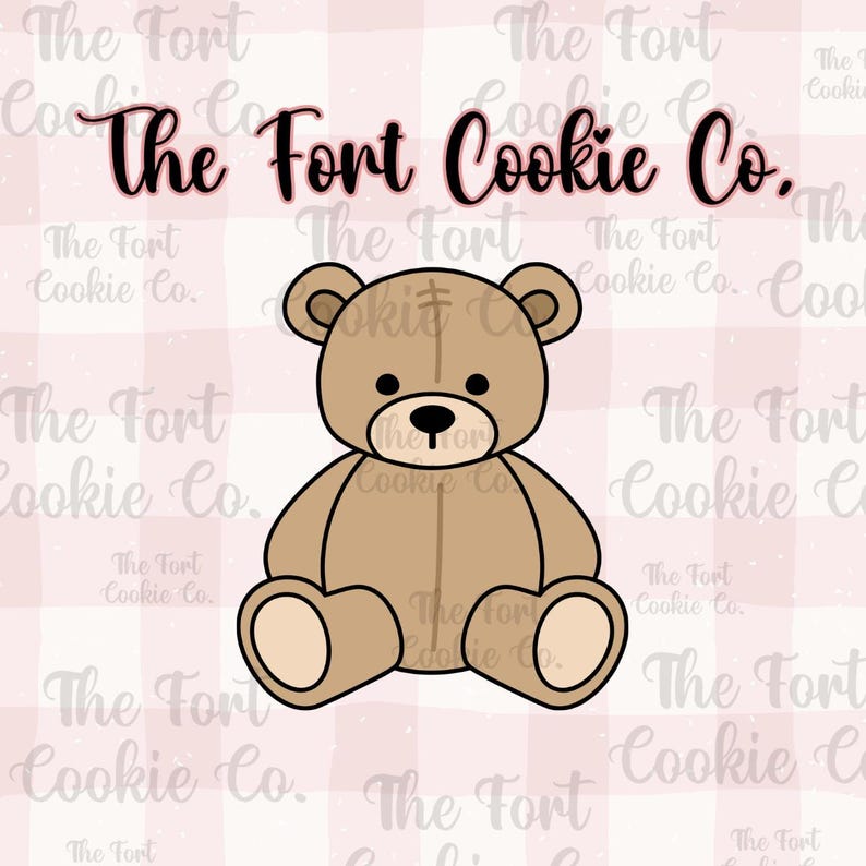 May include: A brown teddy bear cookie cutter with a black outline. The bear has a round black nose and small black eyes. The text "The Fort Cookie Co." is at the top of the image. The background is a pink and white checkered pattern.