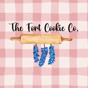 May include: The Fort Cookie Co. logo on a pink and white checkered background. The logo features a wooden rolling pin, blue floral accents, and the company name in black script.