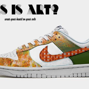 May include: White, orange, and green low-top sneakers with a patterned design. The Nike swoosh is orange and white with a checkered pattern. The text "THIS IS ART?" is above the shoe and the text "wear your heart on your sole" is below the shoe.