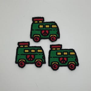 May include: Three embroidered patches of a green van with yellow windows, red wheels, and a red and black roof. Each van features a peace sign on the side. The patches are on a white background.