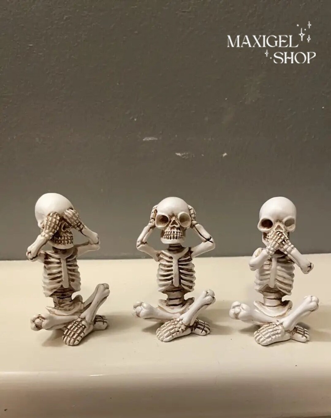 thumbnail image 2 of Creeping Skeletons Skull Figurine Statue - Creepy Halloween Decor 2 of 5