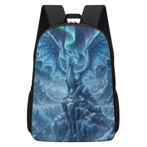 May include: A black backpack featuring a vibrant graphic print on the front panel. The design depicts a large, crystalline blue dragon perched on a jagged, icy mountain peak under a swirling green and purple aurora borealis night sky.