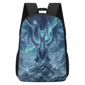 May include: A black backpack featuring a vibrant graphic print of a blue dragon perched on a snowy mountain peak under a crescent moon and aurora borealis. The bag includes black shoulder straps and side mesh pockets for storage and organisation.