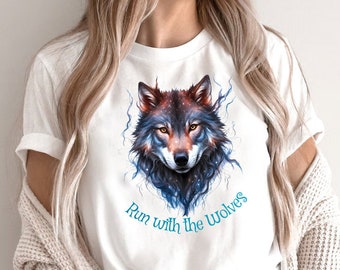 May include: White t-shirt with a colorful wolf graphic and the text "Run with the Wolves" in blue.
