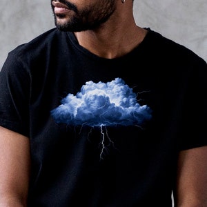 May include: A black t-shirt with a blue and white graphic of a storm cloud with lightning bolts.