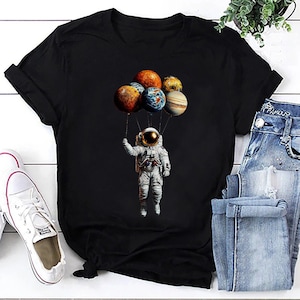 Astronaut Balloon Planets Tee, Space Humor Shirt, Funny Galaxy Astronaut Top, Cosmic Graphic T-Shirt, Outer Space Gift Idea, Stargazing Gift