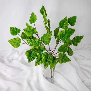 Clematis Vine (paquete de 12): flores artificiales y vegetación realistas