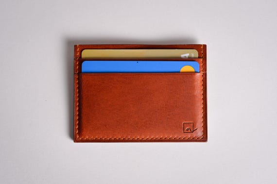 Portefeuille fin en cuir. Porte-carte personnalisé pour homme ou femme
