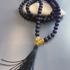 Frankincense 108 mala beads. Purple and yellow beads