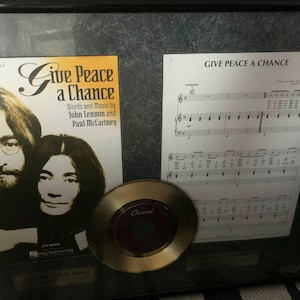 Iohm Lennon and Paul McCartney disc memorabilia