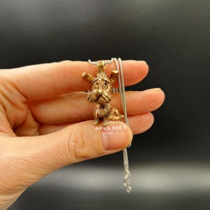 Bronze Dog Pendant for Pet Lovers - Dogmatix Inspired Jewelry with a Silver Plated Chain