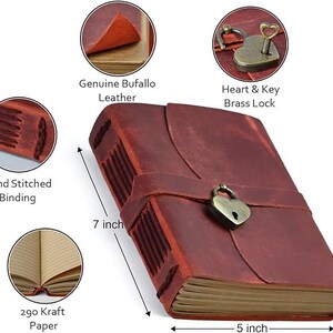 May include: A red leather journal with a heart-shaped lock and key. The journal is 7 inches tall and 5 inches wide. It has hand-stitched binding and 290 kraft paper pages.