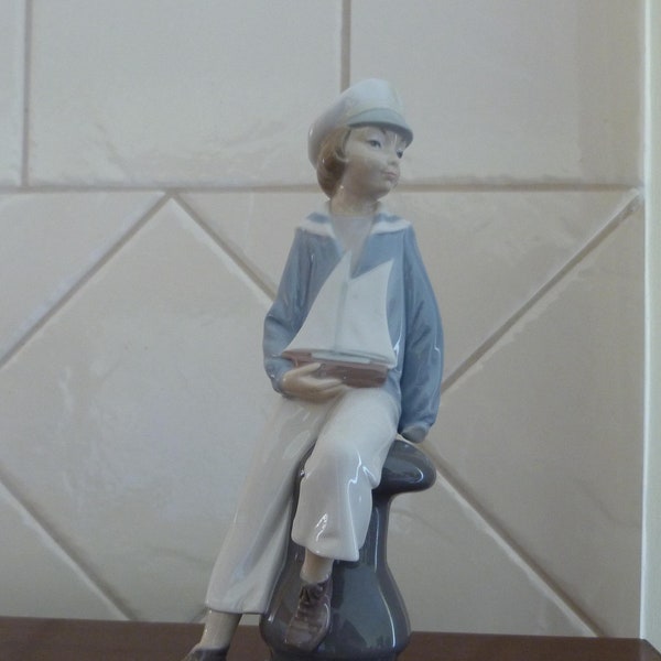 Lladro Figurine Boy with Yacht #4810 (Damaged )