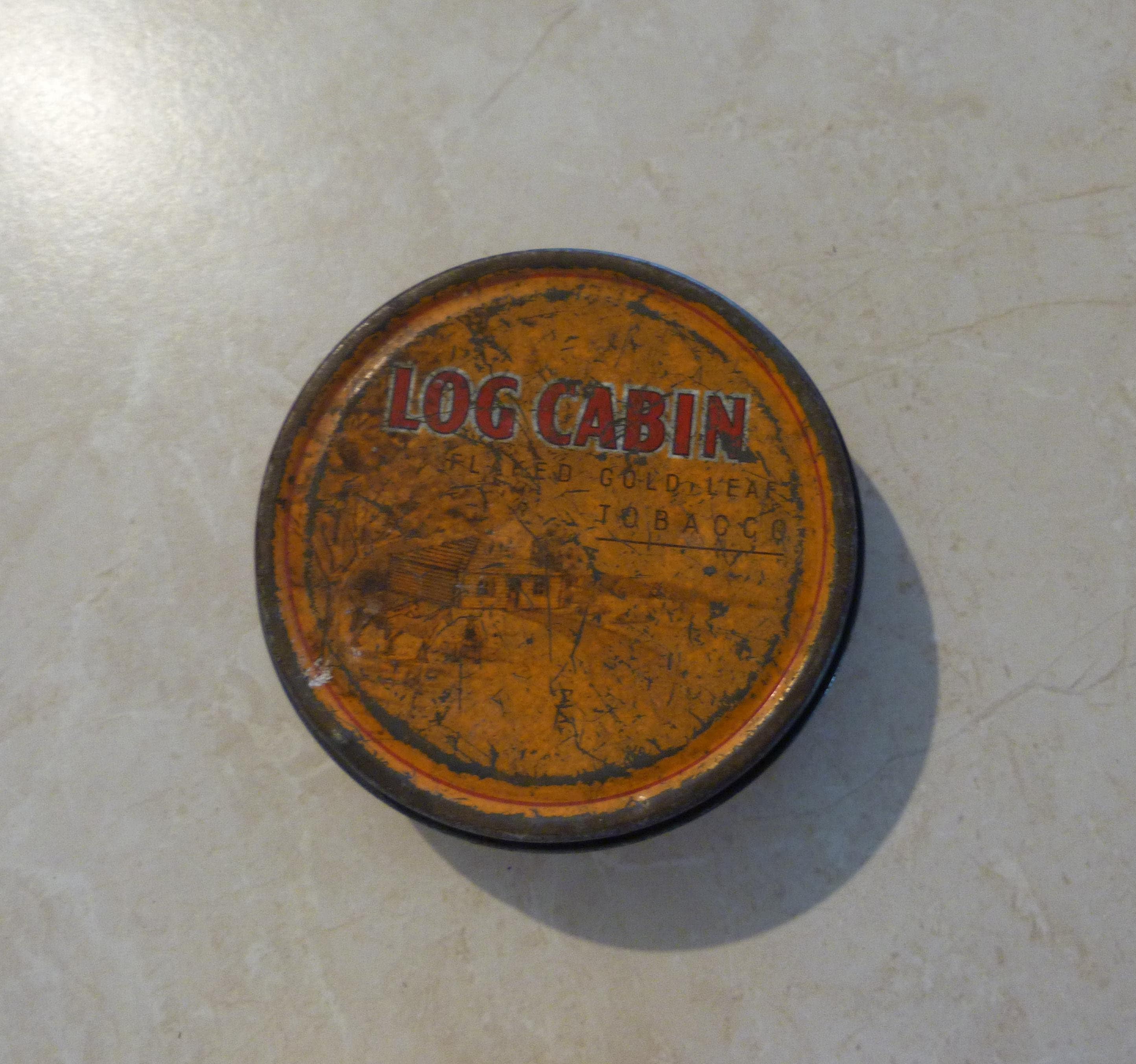 Log Cabin Flaked Gold Leaf Fine Cut Tobacco 2 Oz Net Round Tobacco Tin Made  in Australia (empty)