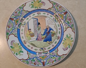 Vintage Chinese Qianlong Nian Zhi porcelain plate featuring hand-painted scenes