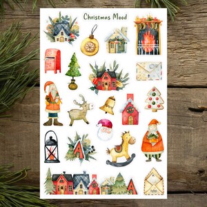 May include: A sheet of Christmas themed stickers featuring illustrations of houses, Santa Claus, reindeer, a rocking horse, a fireplace, a lantern, a bell, a Christmas tree, and an envelope. The text "Christmas Mood" is at the top of the sheet.