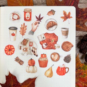 May include: A set of autumn-themed stickers featuring illustrations of pumpkins, leaves, coffee cups, a sweater, a pear, a cupcake, cinnamon sticks, and more.