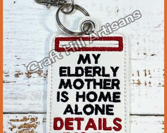 Elderly Mother Home Alone Keyring: White Vinyl Bag Tag with Pocket