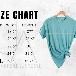 May include: Size chart for a t-shirt with measurements in inches. The chart shows the width and length of the shirt in sizes S, M, L, XL, and 2XL. The text "UNIVERSAL APPERAL" is at the bottom of the chart.