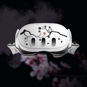 May include: White virtual reality headset featuring a black and red cherry blossom design. The headset has four lenses and a sleek, modern design.