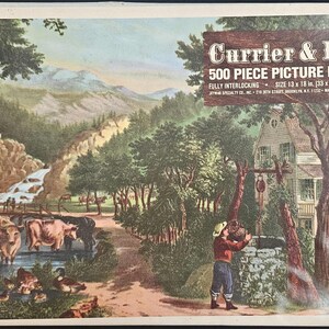 May include: A 500-piece jigsaw puzzle by Currier & Ives depicting a rural scene with a farmhouse, a waterfall, and cows in a field. The puzzle is fully interlocking and measures 13 x 18 inches.