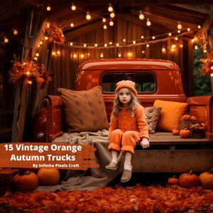 May include: An orange vintage truck bed is decorated for autumn with pumpkins, pillows, and fall foliage. A young person in orange clothing sits in the truck bed. The text "15 Vintage Orange Autumn Trucks" is visible.