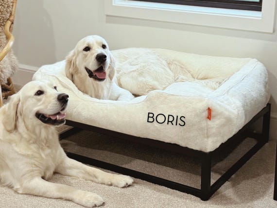 Elevated Orthopedic Dog Bed: White Faux Fur Calming Pet Bed with Black Frame