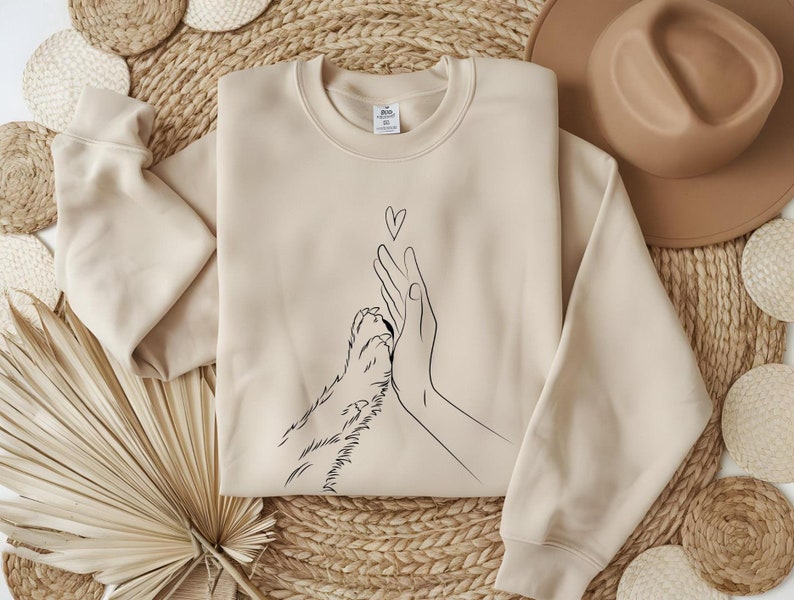 Trendy unisex sweatshirt, T-shirt of hoodie met "high five"-design voor honden- en dierenliefhebbers. Perfect cadeau voor hondenmoeders, Moederdag of hondenbezitters. Verkrijgbaar in diverse kleuren en maten!