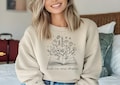 Just One More Chapter Sweatshirt | Book Lover Sweater | Perfect Gift for Readers | Soft and Comfortable | product logo