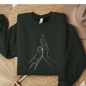 Trendy unisex sweatshirt, T-shirt of hoodie met "high five"-design voor honden- en dierenliefhebbers. Perfect cadeau voor hondenmoeders, Moederdag of hondenbezitters. Verkrijgbaar in diverse kleuren en maten!